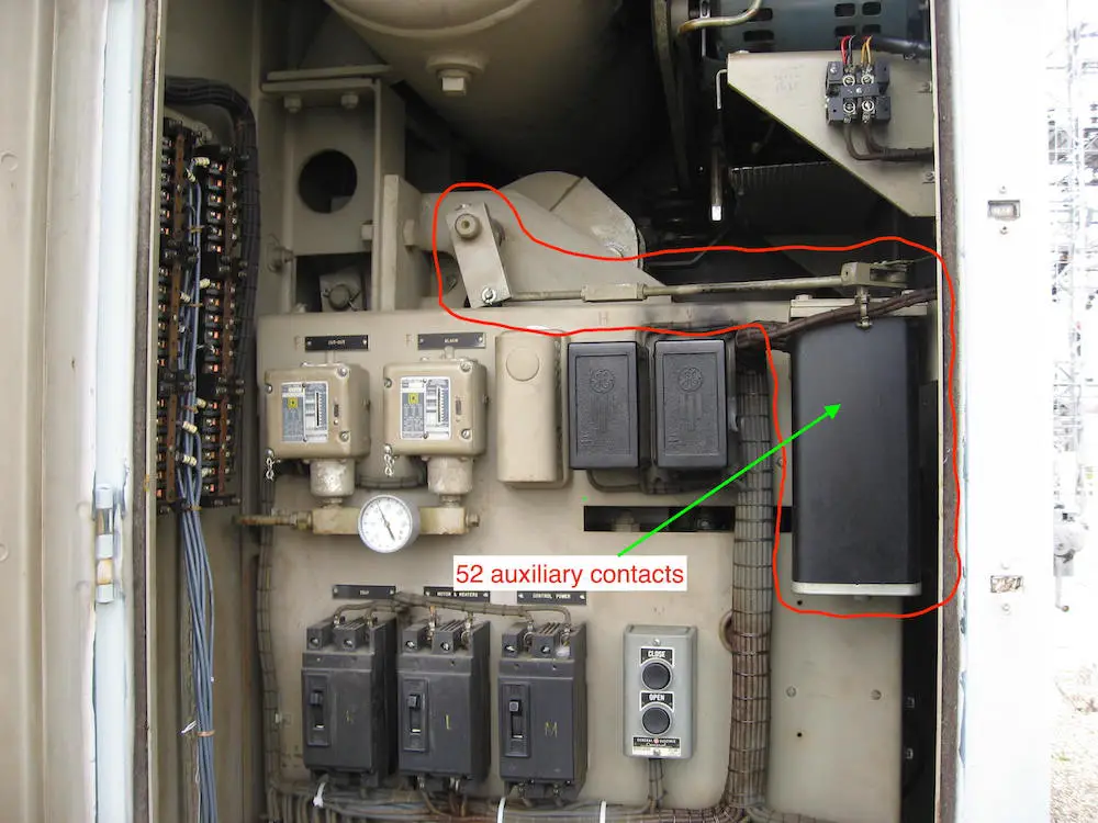 A bank of auxiliary contacts, mechanically tied to the operating rod of the oil circuit breaker